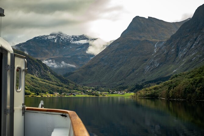 All About the Fjords in One Tour by Boat and Bus from Ålesund - The flooded settlement at Lyngsstøylsvatnet