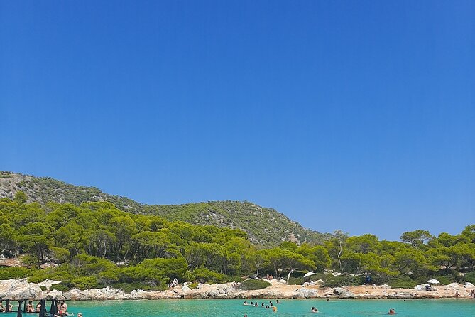 Athens Combo Ticket: Full-Day Cruise and Hop on Hop off Bus - What is served aboard the wooden boat