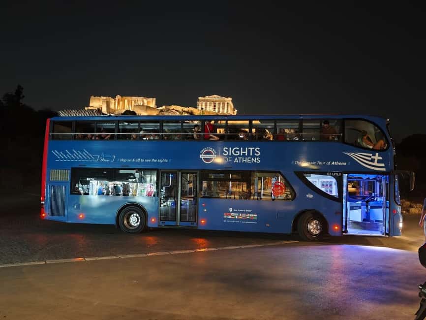 Athens panoramic tour by night with open double decker bus - Passing Parliament, the National Library, and the museum