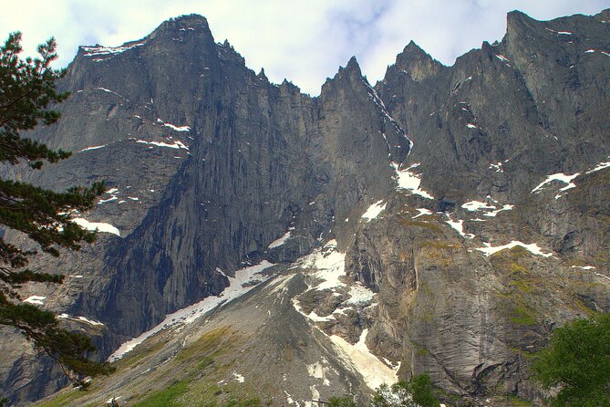 Audio-Guide Bus Tour at Scenic Routes of Åndalsnes to Trollstigen - Romsdalhorn adds mountain drama before the main stop