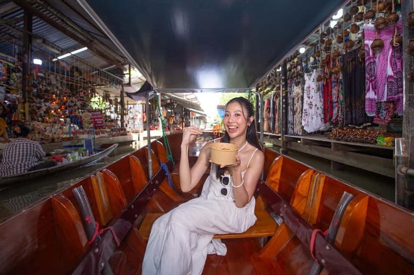 Bangkok: Premium Damnoen Saduak & Railway Market By Food Bus - Watching the train cut through Maeklong Market