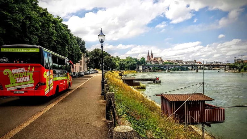 Basel: Sightseeing Bus Tour with Audio Guide - A small Läckerli tasting near the Middle Bridge