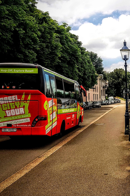 Basel: Sightseeing Bus Tour with Audio Guide - Roche Tower and the museums along St. Alban