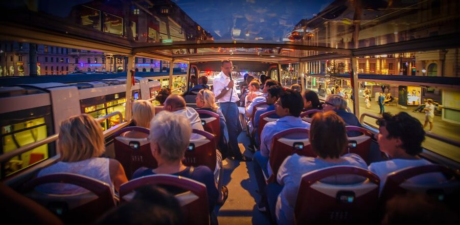 Berlin: Live-Guided Evening Sightseeing Tour by Open-top Bus - Alexanderplatz sets up the evening