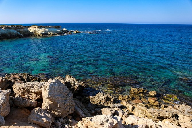 Blue Lagoon and Aphrodite's Baths Guided Day Tour from Paphos - Timing, group size, and the guide’s role