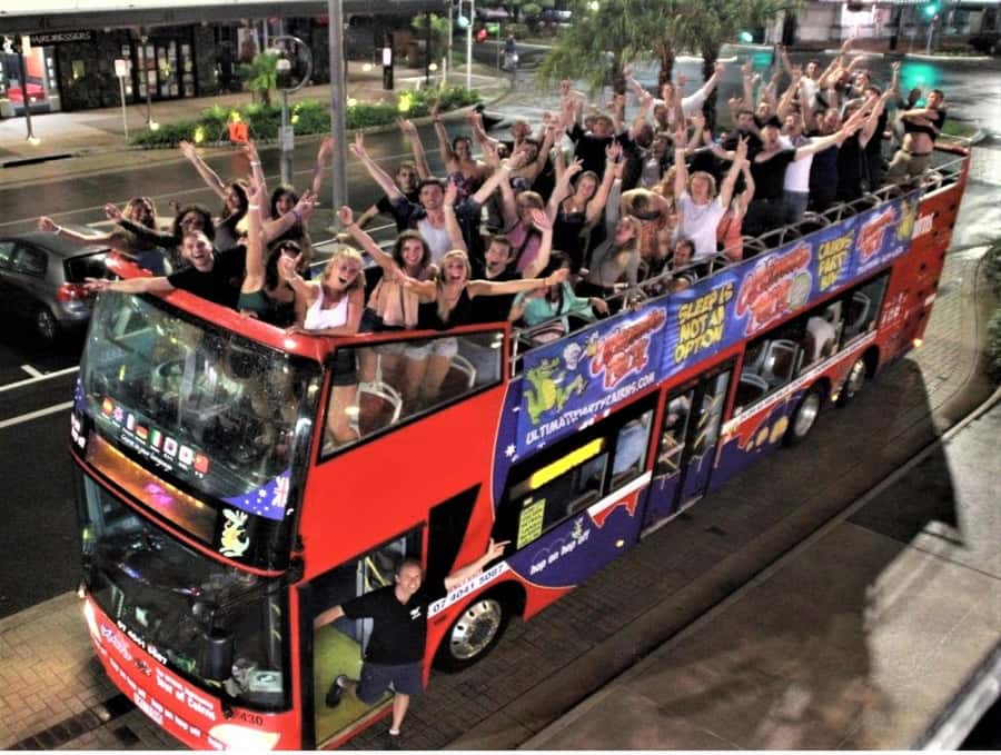 Cairns: Ultimate Party Bus with drinks included - Starting at The Pier Bar on the Cairns waterfront