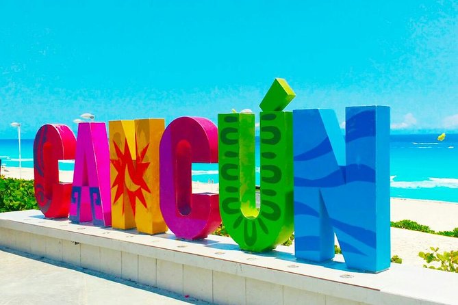 Cancun City Tour by Downtown and Turistic Hightlights on Open Bus - Playa Delfines and the Famous Cancun Sign
