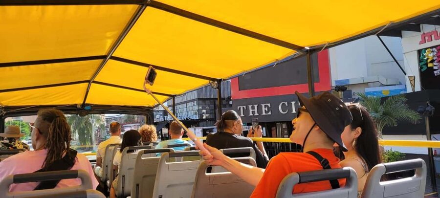 Cancun: Guided City Tour with Shopping by Double Decker Bus - Timing, pickup, and small practical details