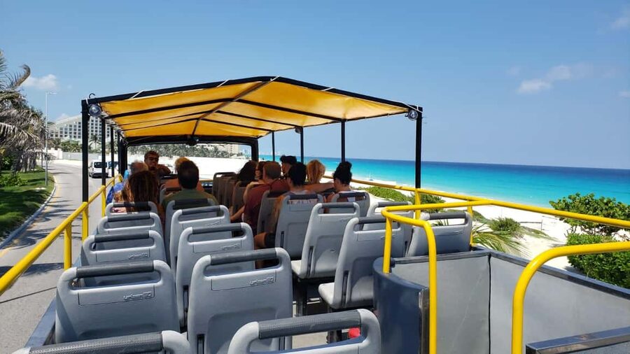 Cancun: Guided City Tour with Shopping by Double Decker Bus - Playa Delfines and the famous Cancun sign