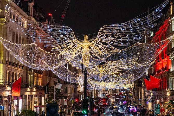 Christmas Lights Tour by Vintage Bus in London - Regent Street beneath the Spirit of Christmas angels