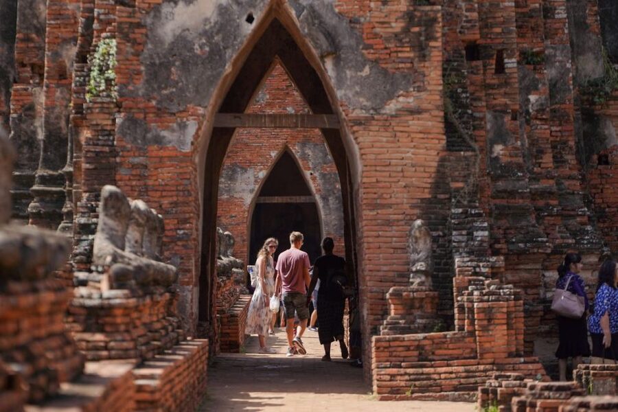 From Bangkok: Ayutthaya Historical Day Tour by Bus - Wat Mahathat and the Buddha head in tree roots