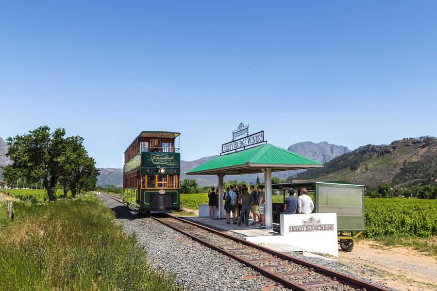 From Cape Town: Franschhoek Wine Tram Hop-on Hop-off - Boarding the tram and choosing your route