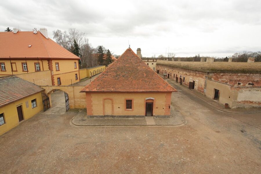 From Prague: All-inclusive Bus Tour to Terezin Memorial - Walking, comfort, and emotional demands