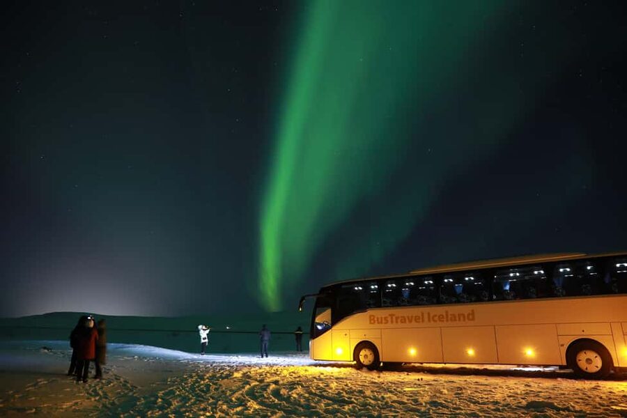 From Reykjavik: Northern Lights Bus Tour with Hot Cocoa - Leaving Reykjavik after dark