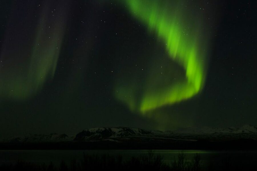 From Reykjavik: Northern Lights Bus Tour with Hot Cocoa - The free retry and its limits