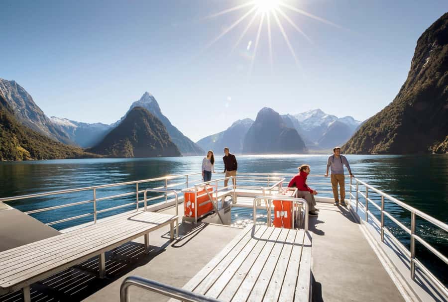From Te Anau: Milford Sound Premium Bus Tour and Cruise - Waterfalls, seals, dolphins, and penguins