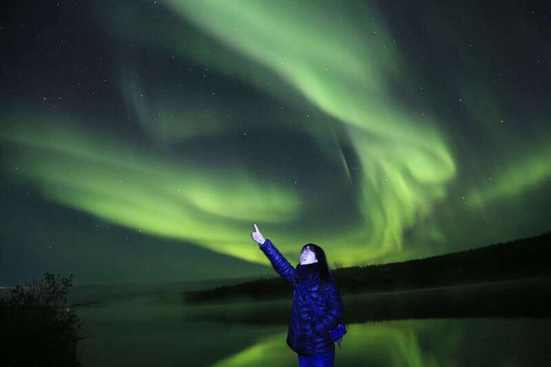 From Yellowknife: Northern Lights Bus Tour with Photos - Stop two: chasing clearer views