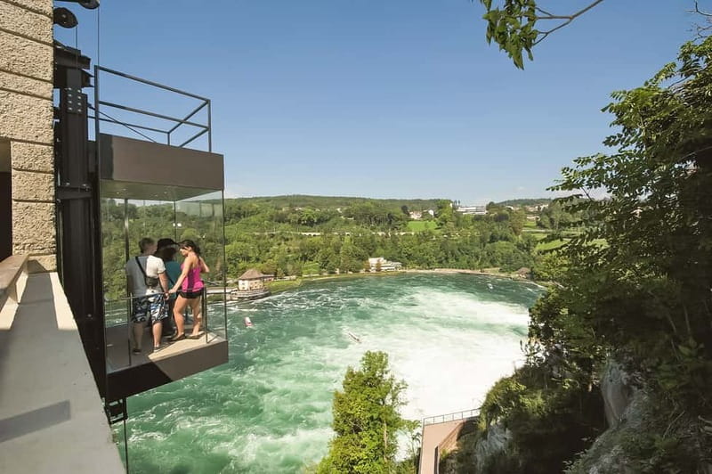 From Zurich: Rhine Falls Coach Tour with Entry Tickets - Arriving at the Rhine Falls at Laufen Castle
