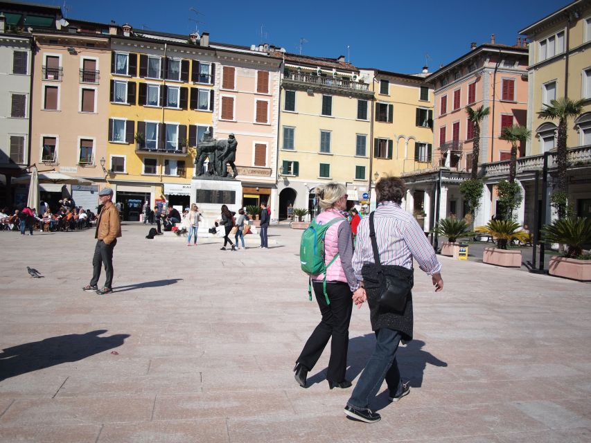 Full-Day Lake Garda Tour: Bus & Public Boat with Guide - What the public boat adds to the day