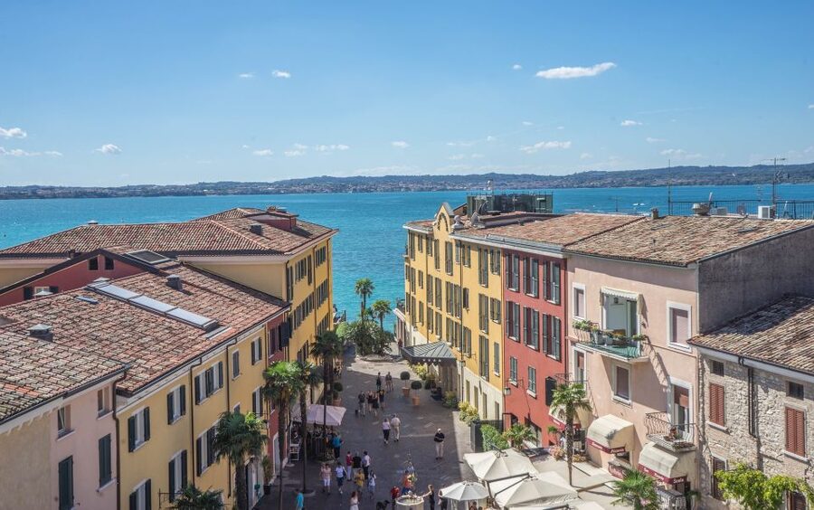 Full-Day Lake Garda Tour: Bus & Public Boat with Guide - The coach ride is part of the value