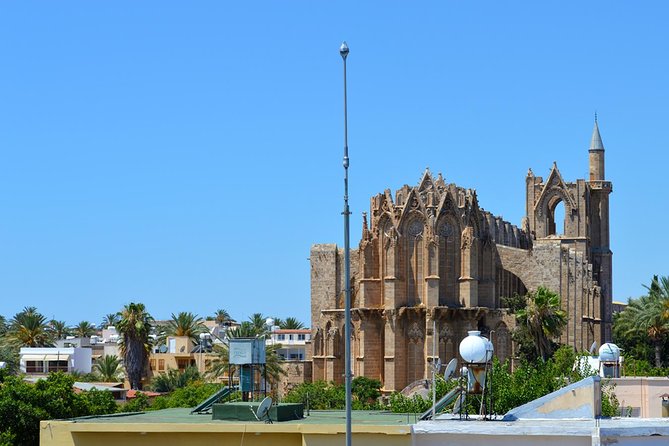 Ghost-Town Famagusta Mini Bus Tour from Protaras and Ayia Napa - Walking through the ghost town and along Golden Sand Shore