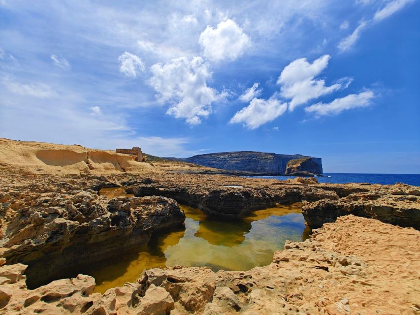 Gozo Sightseeing Hop On Hop Off Tour - Ramla Bay and the red sand