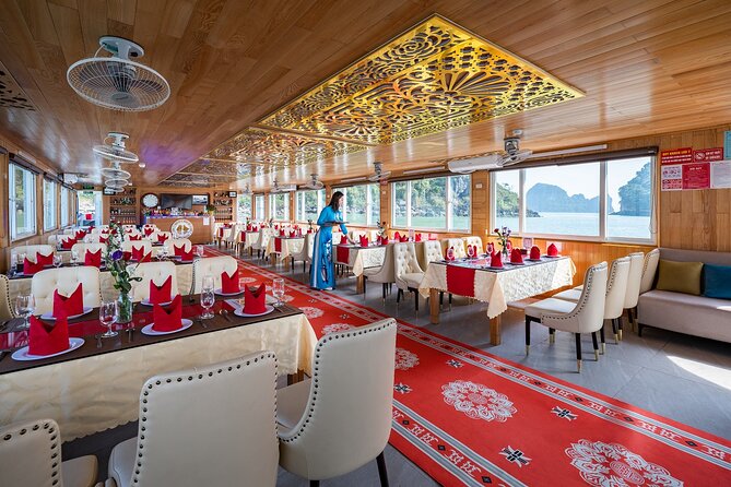Ha Long Bay Day Cruise, Cave, Kayaking, Swimming, Bus & Lunch - Titov Island, beach time, and the climb uphill