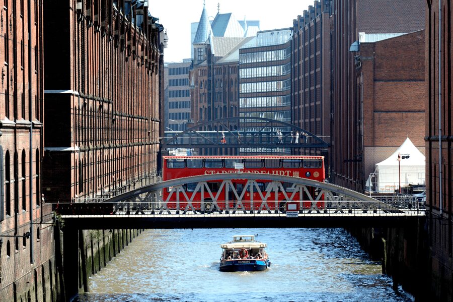 Hamburg Discovery: Bus Tour with Harbor & Alster Lake Cruise - What to see at the harbor piers and Reeperbahn