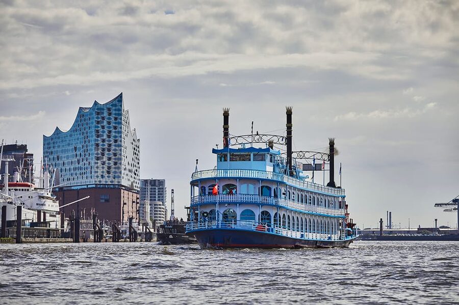 Hamburg: Harbor Cruise and Bus City Hop-On Hop-Off Tour - Audio guides, staff, and the feel of the experience