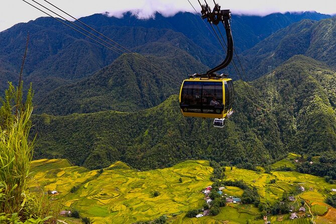 Hanoi to Fansipan Peak 2-Day Bus Tour plus Lodging, Meals, and Pickup - Sapa lunch, hotel check-in, and a first taste of mountain culture