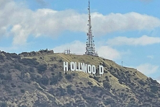 Hollywood, Beverly Hills & Celebrity Homes by Open Air Bus - Movie clips, audio options, and the guide’s role