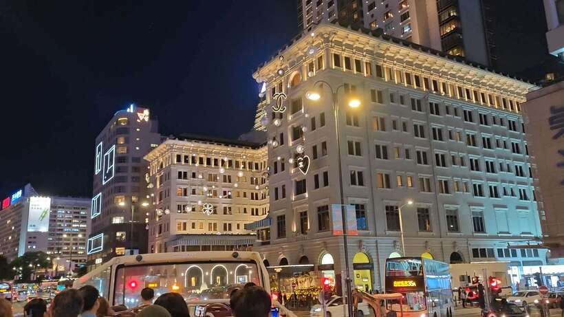 Hong Kong: Panoramic Night Tour of Kowloon by Open-top Bus - Nathan Road and Canton Road under neon