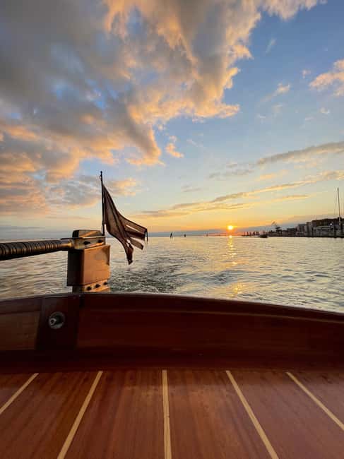 Hop on board an old Venetian boat - St. Mark’s Basin and the best photo stop
