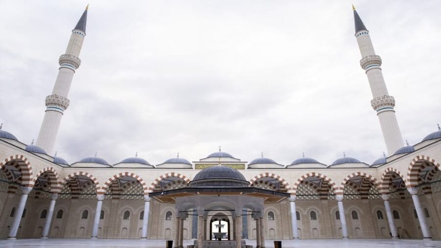 Istanbul: City Hightlights Bus Tour and Bosphorus Cruise - Eyup Sultan Mosque shifts the mood again