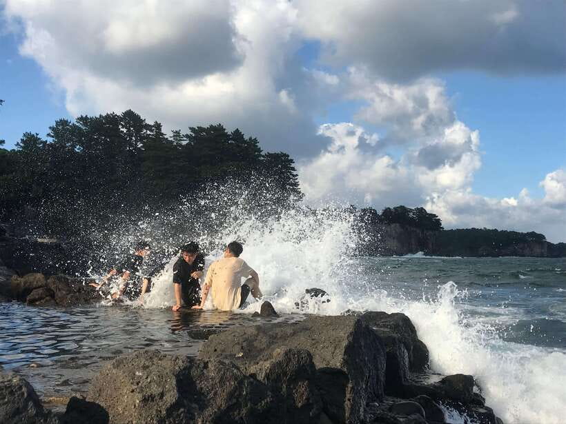 Jeju: East of Jeju Island Bus Tour from Seogwipo City - Woljeong-ri Beach: a short break with bright water
