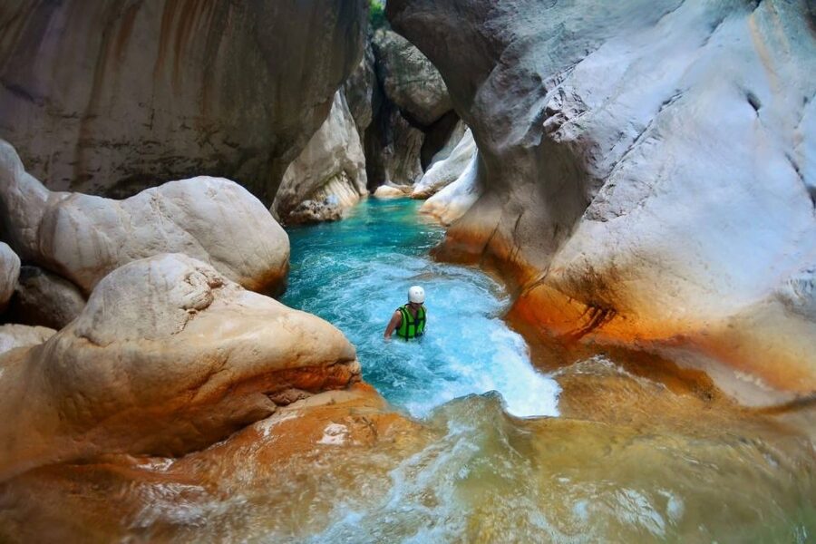 Kemer: Party Bus to Goynuk Canyon with Entrance Ticket - Walking toward the waterfalls and main canyon