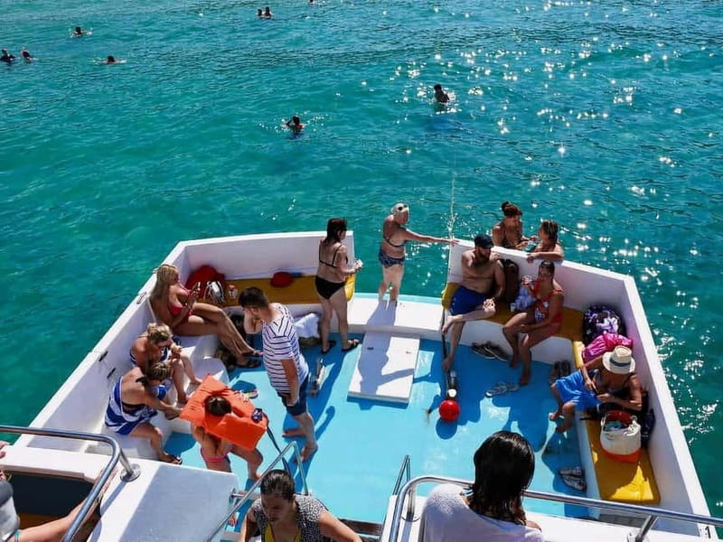 Limassol: Aphrodite Baths & Blue Lagoon Bus & Boat Day Trip - Onboard refreshments and the tone of the boat ride
