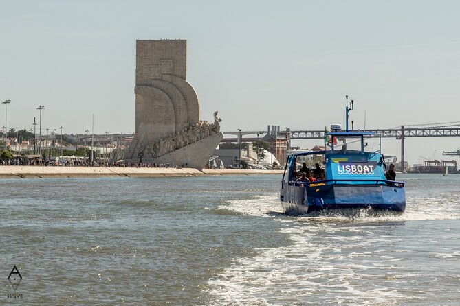 Lisbon Hop On Hop Off Bus and Boat Tour - The boat along the Tagus