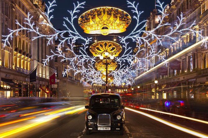 London by Night Bus Tour with Christmas Lights and Live Guide - Trafalgar Square adds tradition and a famous tree