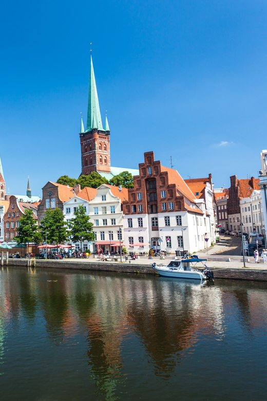 Lübeck: 1-Hour Splash Bus City Tour - The road section, shops, bridges, and old houses