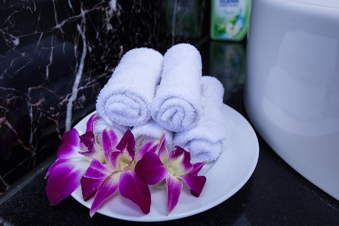 Luxury Halong Bay 1 Day on Cruises From Hanoi with Bus & Lunch - Titov Island, swimming, and the price of a wet afternoon