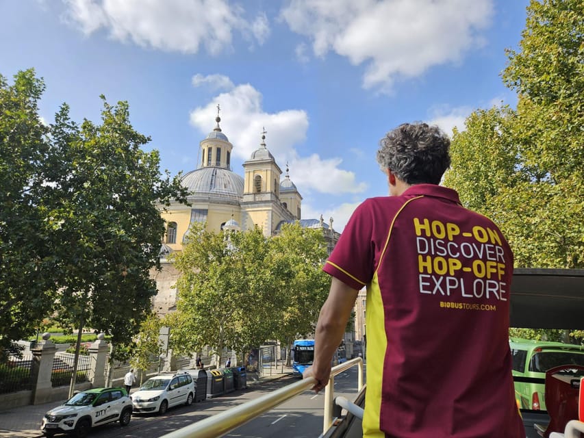Madrid: Open-Top Big Bus Sightseeing Tour with Live Guide - Upper-deck views, weather, and comfort