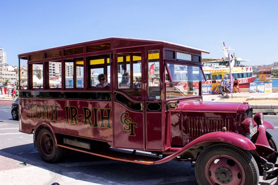 Malta: Vintage Bus Ride through the Three Cities - Crossing the harbor area through Valletta and beyond