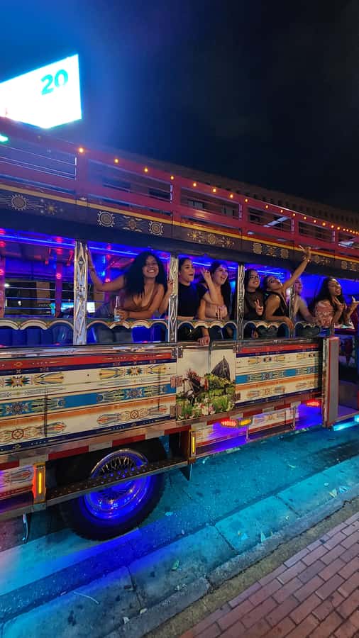Medellin: Party Bus with DJ & Street Food Tastings - The Golden Mile and Medellín’s polished side