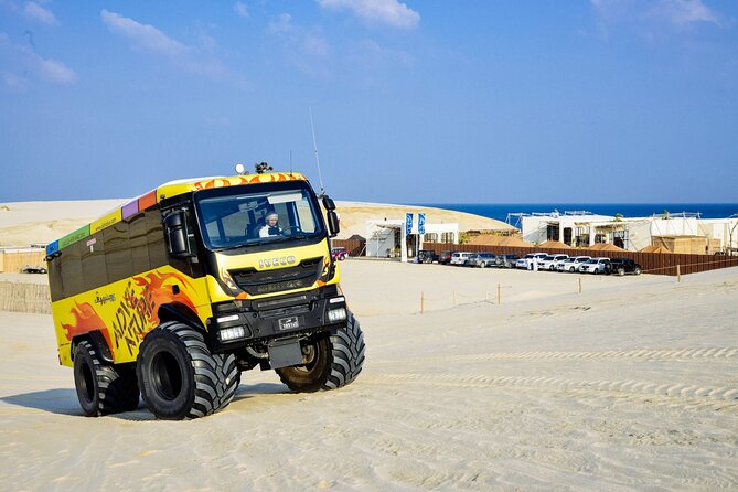 Monster Bus desert adventure: Dune bashing and sandboarding - Sealine Beach and the meeting of sand and water