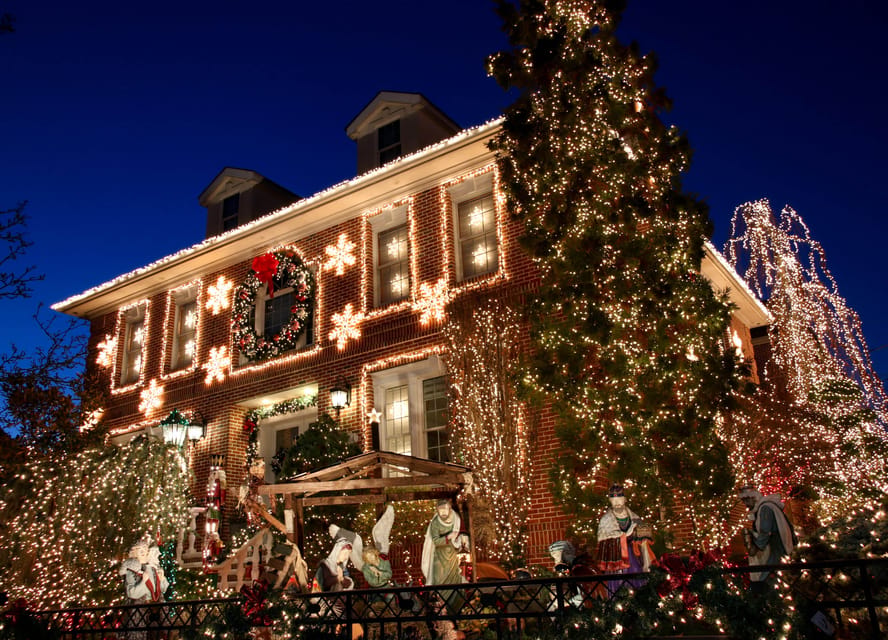 NYC: Dyker Heights and NYC Holiday Lights Luxury Bus Tour - Lower Manhattan, the harbor, and a moment of reflection