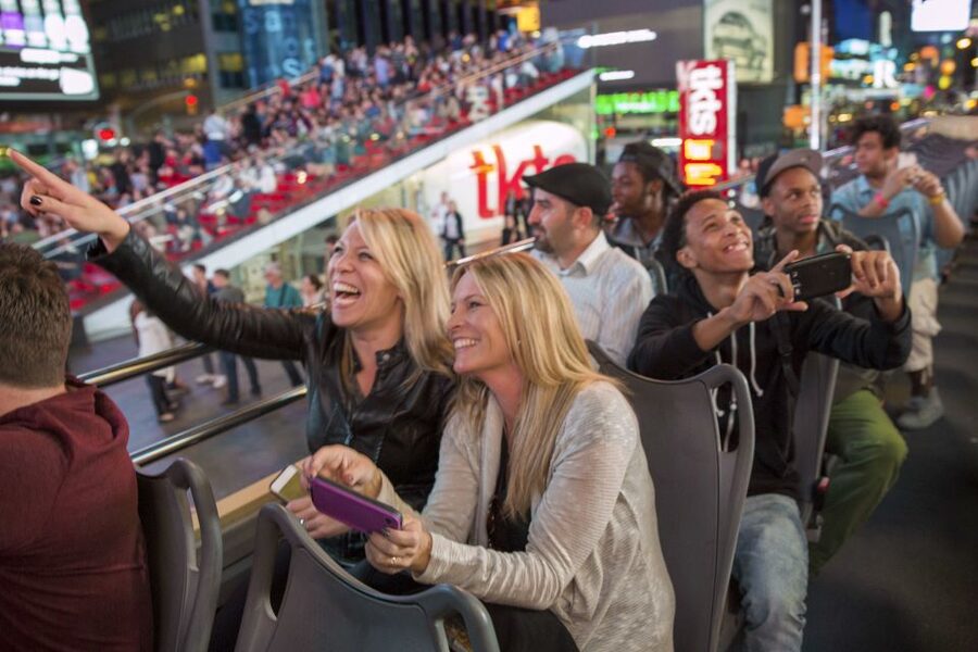 NYC: Sightseeing Night Tour by Open-Top Bus with Live Guide - Avenue of the Americas, Macy’s, and Radio City Music Hall
