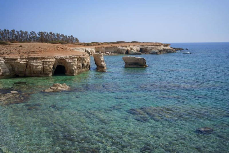 Paphos/Akamas: Blue Lagoon Bus & Boat Tour with Water Slide - Lunch and free time in Polis
