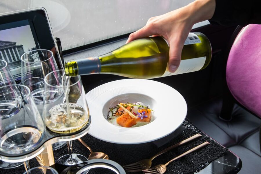 Paris: Champs Elysées Bus Toqué w/Lunch & Glass of Champagne - The guide, music, and onboard comfort