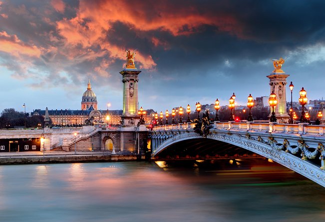 Paris Lights Evening Bus Tour with Eiffel Tower Summit Option - The Louvre and the Seine at night
